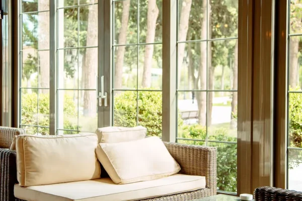 outdoor-sofa-with-beige-cushions-coffee-table-front-restaurant-window_140725-2562 outdoor-sofa-with-beige-cushions-coffee-table-front-restaurant-window_140725-2562